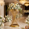 Gold spiral column meander fretwork rim stand hotel wedding 45 degree warm spotlights
