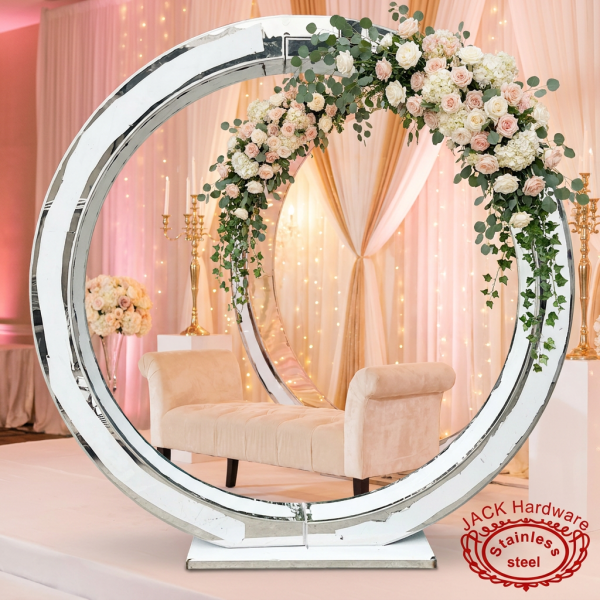 Silver multi-ring moon gate at hotel ballroom photo booth white blush florals fairy light bokeh
