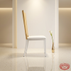 Gold mirror backrest white leg chair side view luxury event space clean modern silhouette