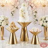 Gold hourglass 3-piece stand set at wedding dessert display cake macarons roses chandeliers