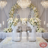 Silver gothic pointed arch chairs as wedding ceremony stage decorative thrones white florals chandeliers