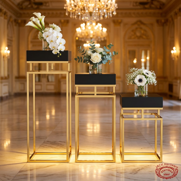 Gold black square 3-piece stands side view ballroom cascading staircase warm uplighting marble