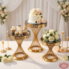Gold twisted spiral base cake stands at hotel wedding reception fretwork rim dark mirror tops 45 degree