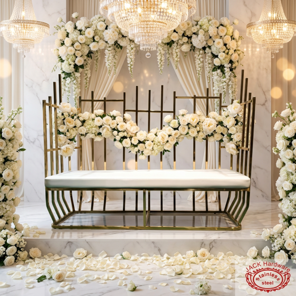 Gold tube fence bench at grand wedding venue sweetheart seat white florals chandeliers castle