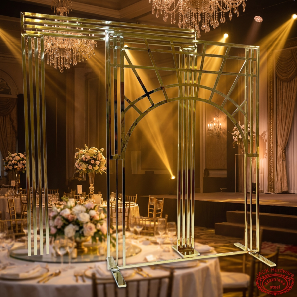 Gold sunburst arch at hotel ballroom wedding reception dramatic main stage piece spotlights