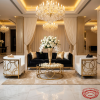 Gold ring frame sofa set at luxury hotel lobby wedding hall black sofa white chairs chandeliers