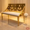 Gold perforated double bench side view luxury event space wide silhouette warm light