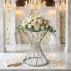 Silver double-ring hourglass frame stand at wedding florals guest book chandeliers crossing bars