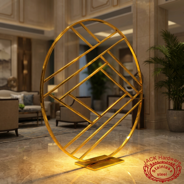 Gold diamond lattice moon gate at hotel lobby garden golden LED uplighting marble reflections
