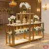 Gold frame white shelf display rack hotel wedding 45 degree geometric shadow warm spotlights