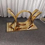 WENDING gold wing-and-ring sculptural base marble dining table art object hotel table