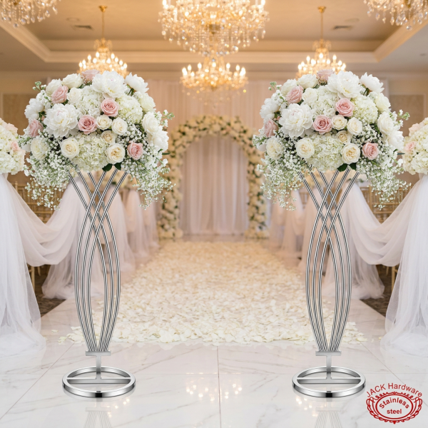 Silver chrome spindle stands flanking wedding aisle white peonies hydrangeas petal aisle chandeliers
