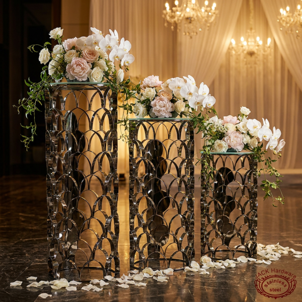 Dark fish-scale petal disc cylinder stands hotel wedding event 45 degree layered pattern warm spotlights