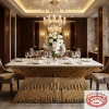 Gold tube-bundle fountain base marble dining table at luxury hotel dining room crystal chandeliers