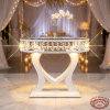 White heart frame crystal pendant cake table side view wedding venue prismatic sparkle romantic bokeh