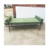 WENDING black iron scrollwork bed end bench emerald green velvet bolster ottoman hotel suite