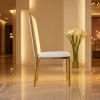 Gold bamboo-node high-back chair side view luxury event tall silhouette node legs warm golden