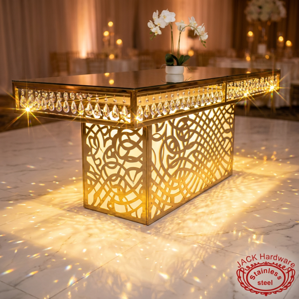 Gold crystal pendant signing table side view marble floor prismatic sparkle rainbow uplighting