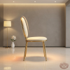 Gold round drum chair side view contemporary luxury interior clean drum silhouette warm light