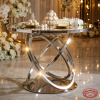 Silver abstract looping ring base table at hotel wedding dessert display macarons 45 degree sparkle