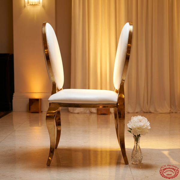 Gold oval cabriole banquet chair side view luxury event space elegant silhouette warm golden light