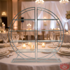 Round display shelf at upscale banquet reception candlelight ambiance