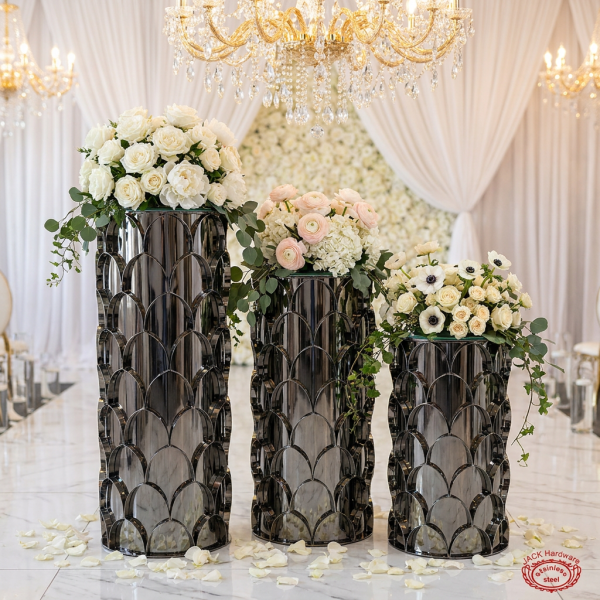 Dark mirror fish-scale cylinder 3-piece stands at wedding floral display white roses frosted tops chandeliers