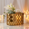 Gold fish-scale rectangular vase side view wedding reception candlelight warm shimmering scales
