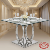 Silver oval-ring intersecting column base dining table at luxury hotel private dining room crystal chandelier