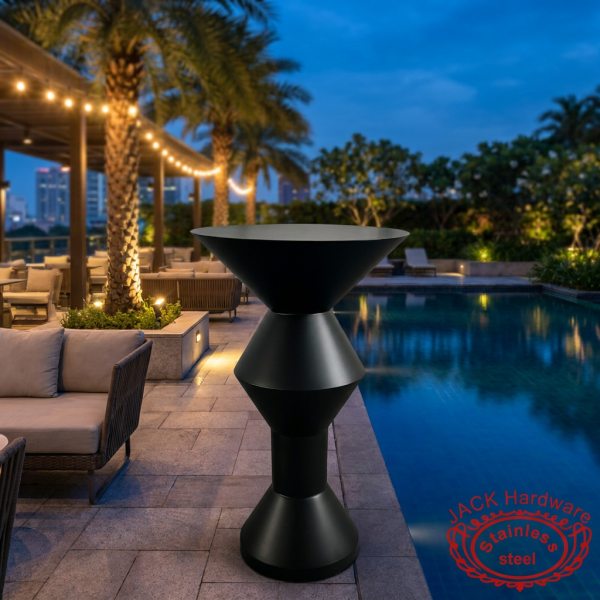 Black cocktail bar table at upscale hotel outdoor terrace poolside bar evening ambient lights