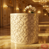 White baroque scrollwork cylinder table at hotel banquet hall warm spotlights 3D pattern detail