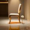 Gold oval upholstered chair side view luxury event space cabriole silhouette warm ambient