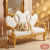 Heart-back wedding loveseat hotel bridal suite 45 degree gold carved frame detail warm lighting