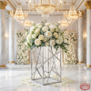 Silver crosshatch mesh square stand at wedding centerpiece white roses peonies chandelier shadow