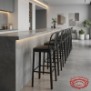 Black arc-back bar stools at contemporary boutique hotel lounge bar counter minimalist