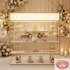Gold white 4-tier lightbox rack at luxury wedding dessert champagne station soft glow