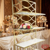 Wave lattice floral display rack at luxury hotel banquet champagne ivory decor candlelight