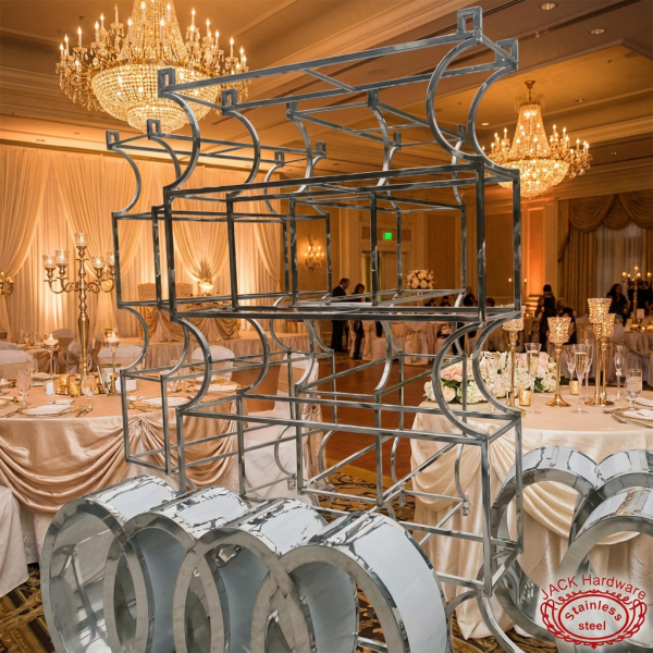 Silver ring arch frame at luxury ballroom wedding reception champagne ivory crystal chandeliers