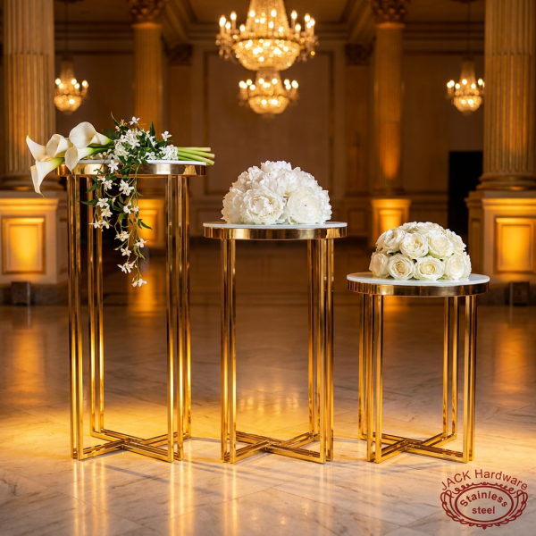 Gold 3-piece round pedestal set side view grand ballroom cascading heights warm uplighting
