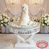 White heart-frame crystal pendant cake table with tiered wedding cake roses chandeliers sparkle