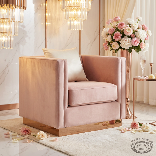 Powder pink velvet box armchair at luxury hotel lobby VIP area florals chandeliers