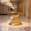 Gold spiral woven column Greek key rim side view ballroom uplighting light lattice shadow marble