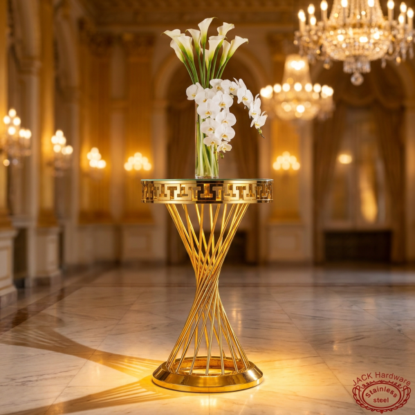 Gold spiral column trumpet base full silhouette side view ballroom warm uplighting shadow marble