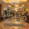Circular display rack at elegant hotel lobby with marble floors crystal chandeliers