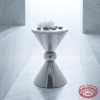Silver marble accent table in 5-star hotel spa relaxation lounge white orchids zen minimalist